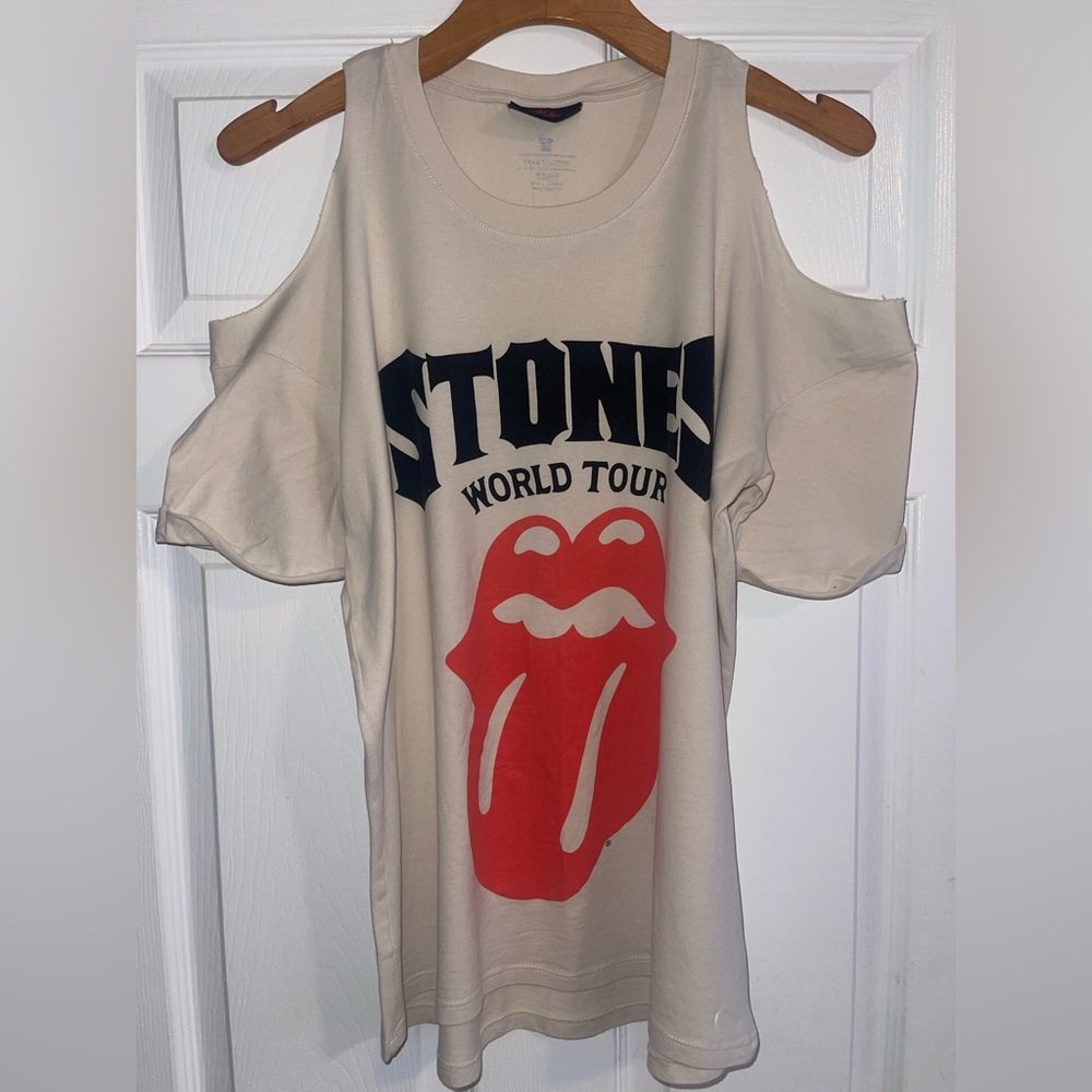 the Rolling Stones Cream Tee with Black Neck Label and Red Script